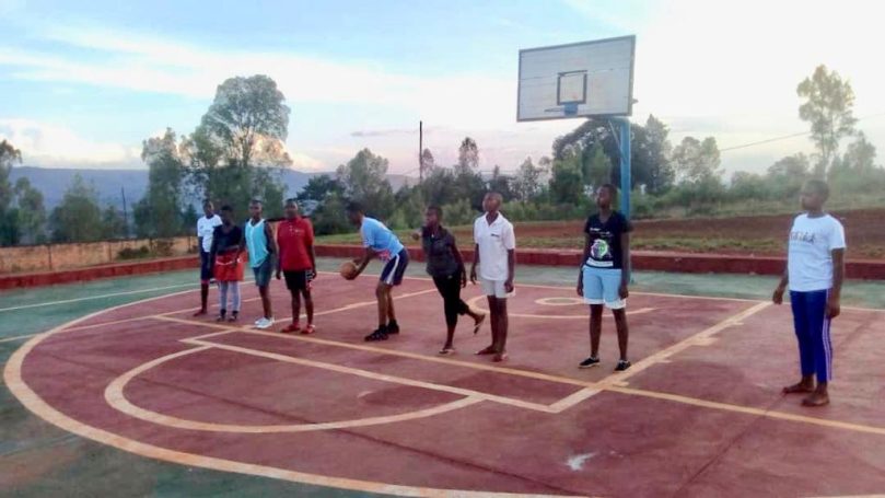 Students using new Basketball/Volleyball Court