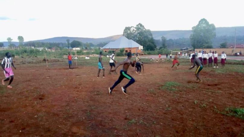 Students Playing Football